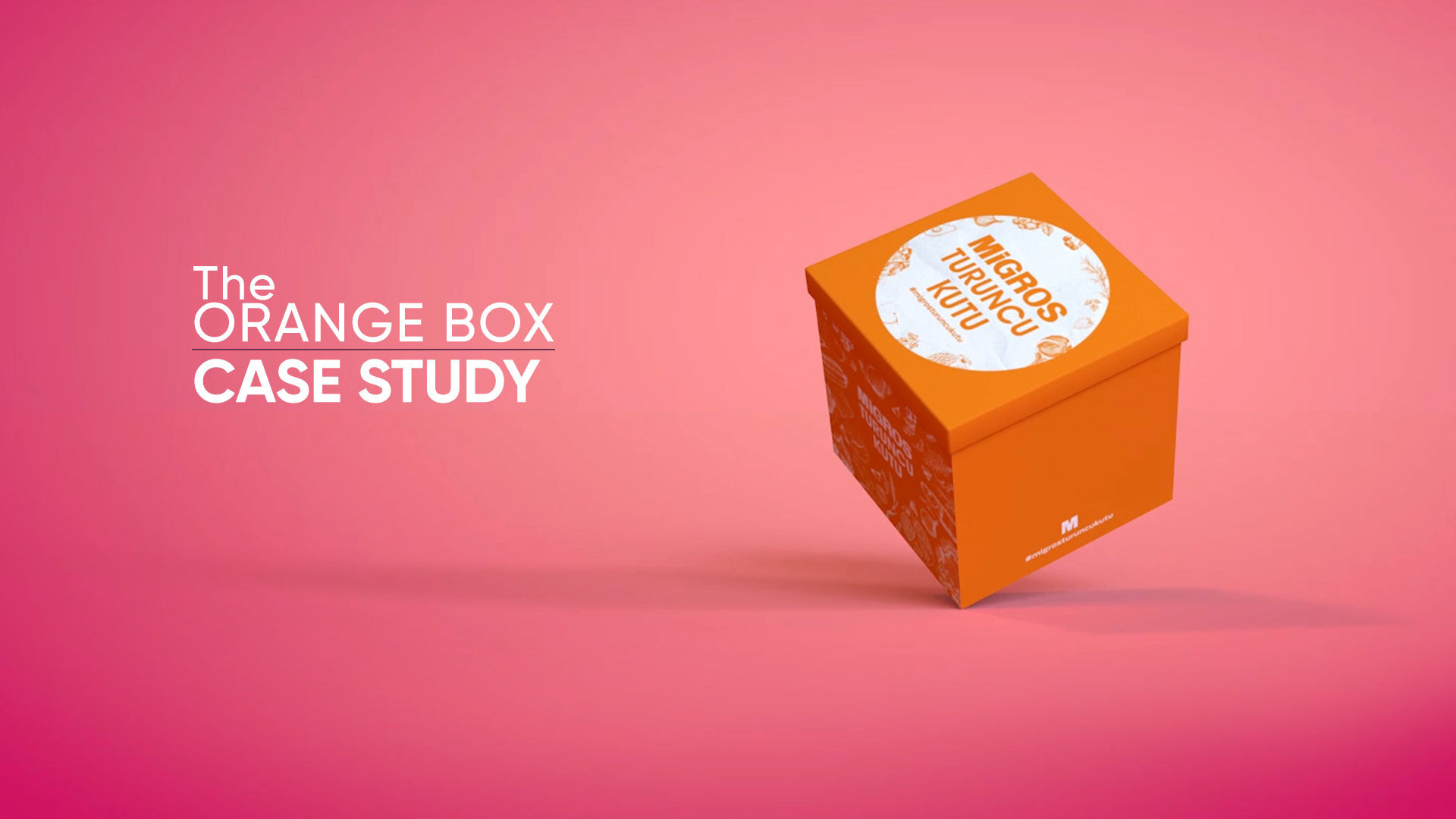 A floating orange Migros box on pink, from The Orange Box 3D animation case study
